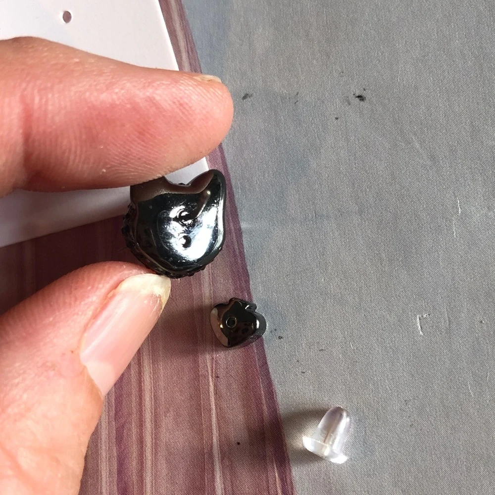 Authentic Kate spade cat stud earrings. New with card.